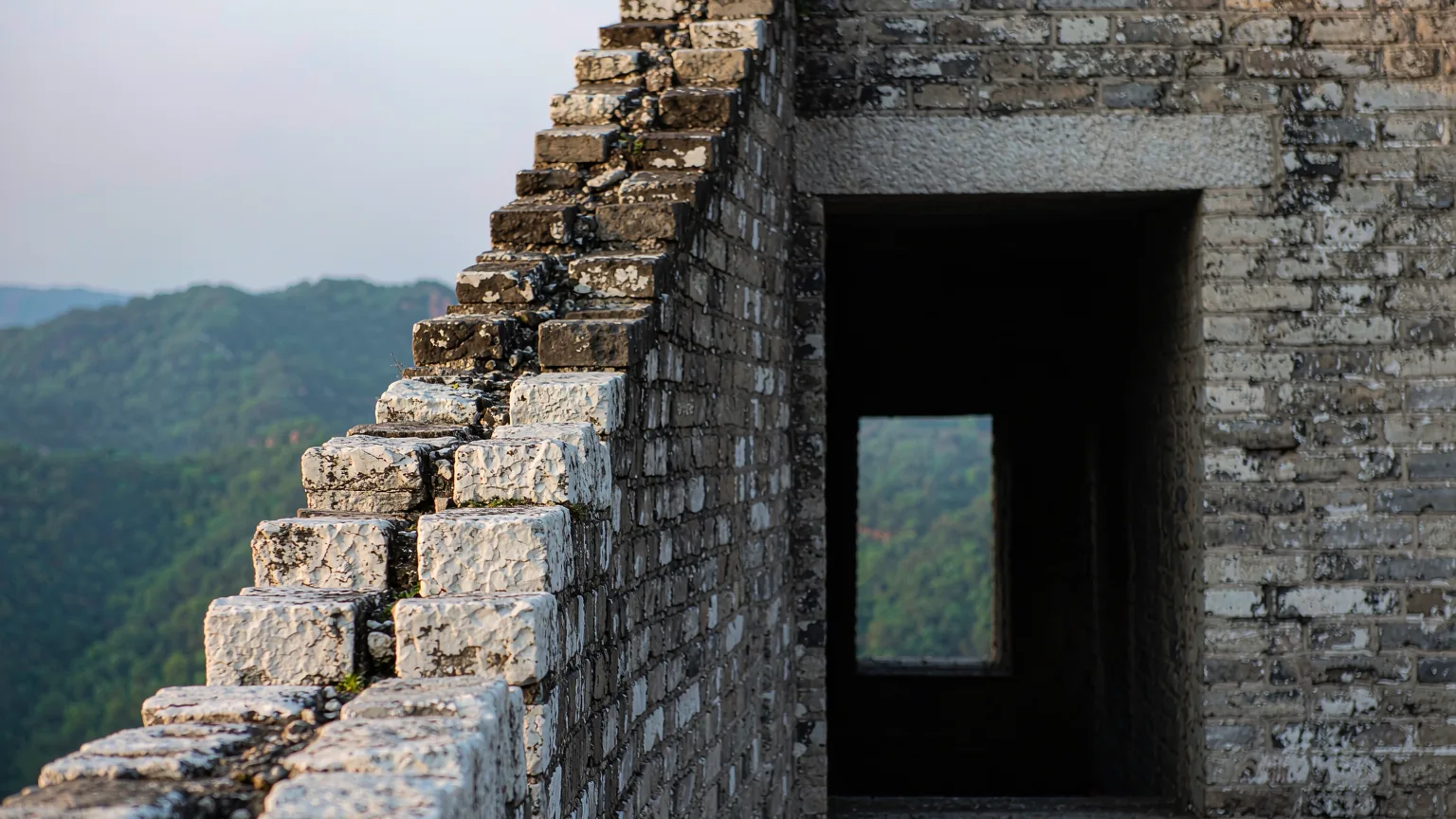 Close-up of weathered Ming bricks and crenellations on Badaling Great Wall