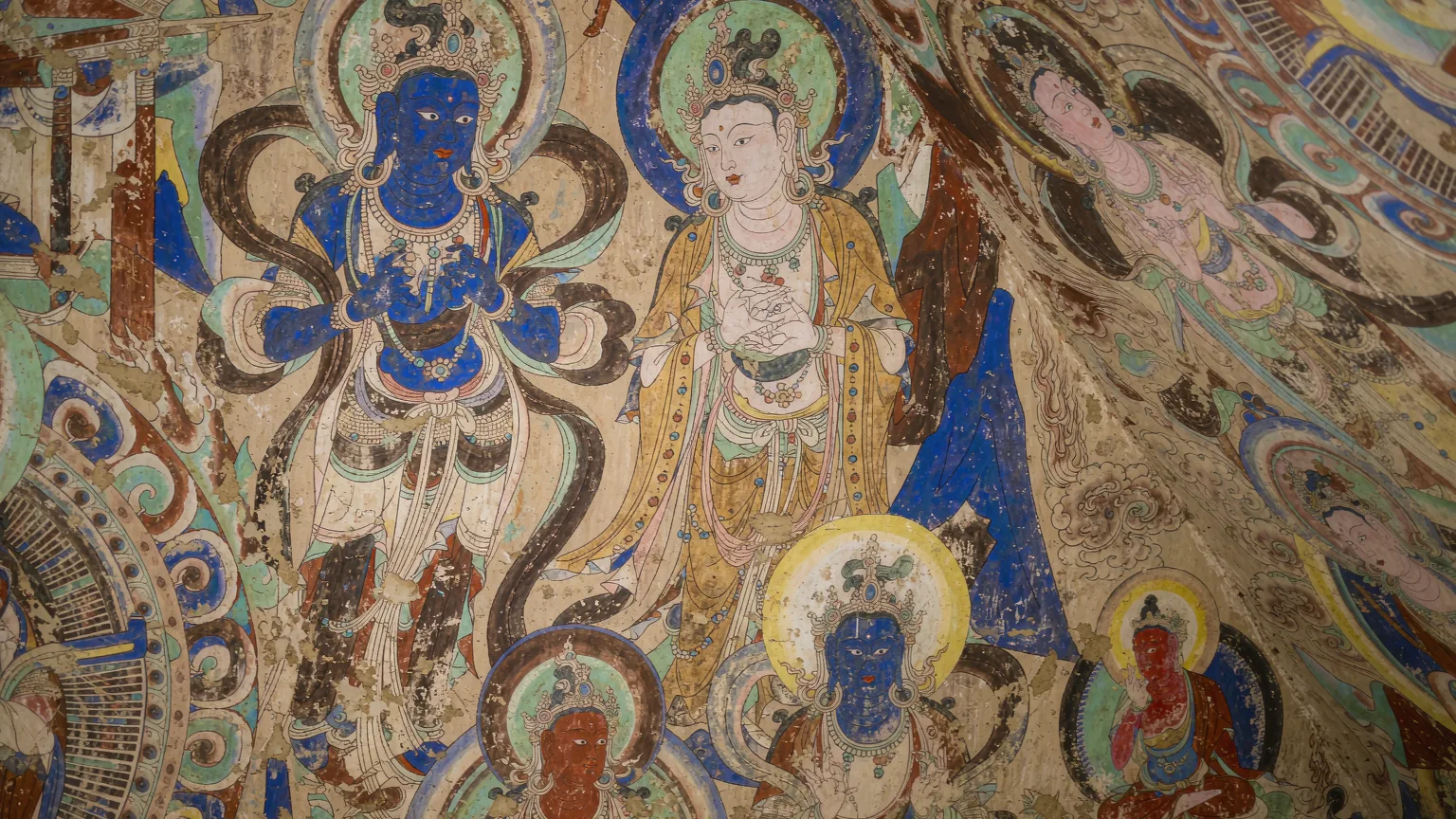Detailed view of ancient Baisha Mural with Buddhist deities