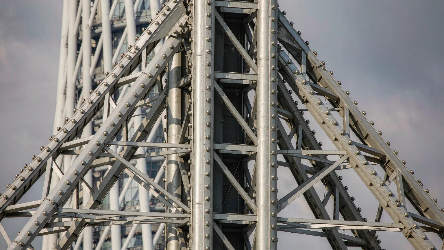 Detailed steel lattice and rivets of Canton Tower in sunlight
