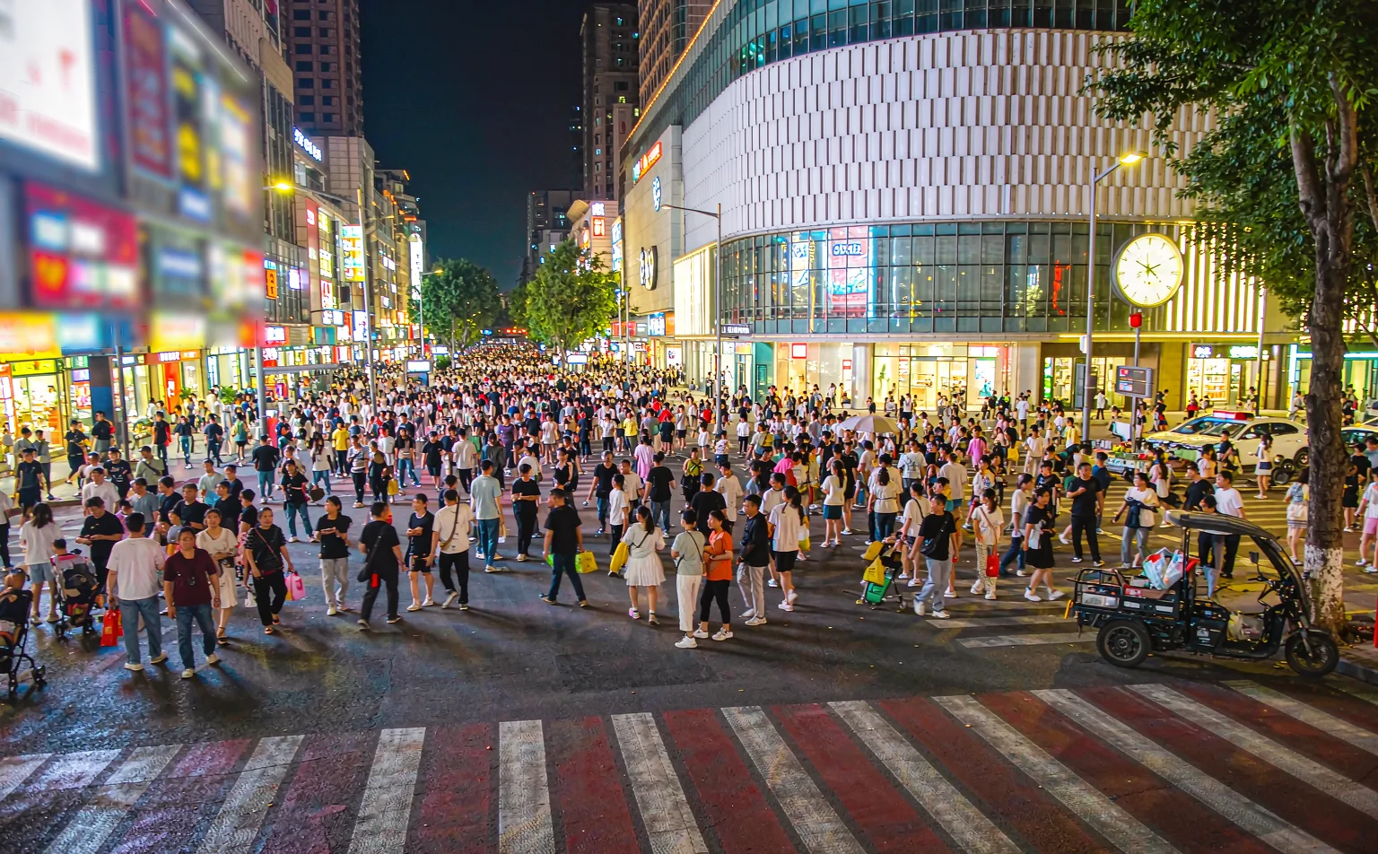 Chunxi Road shopping street in Chengdu at night with neon lights