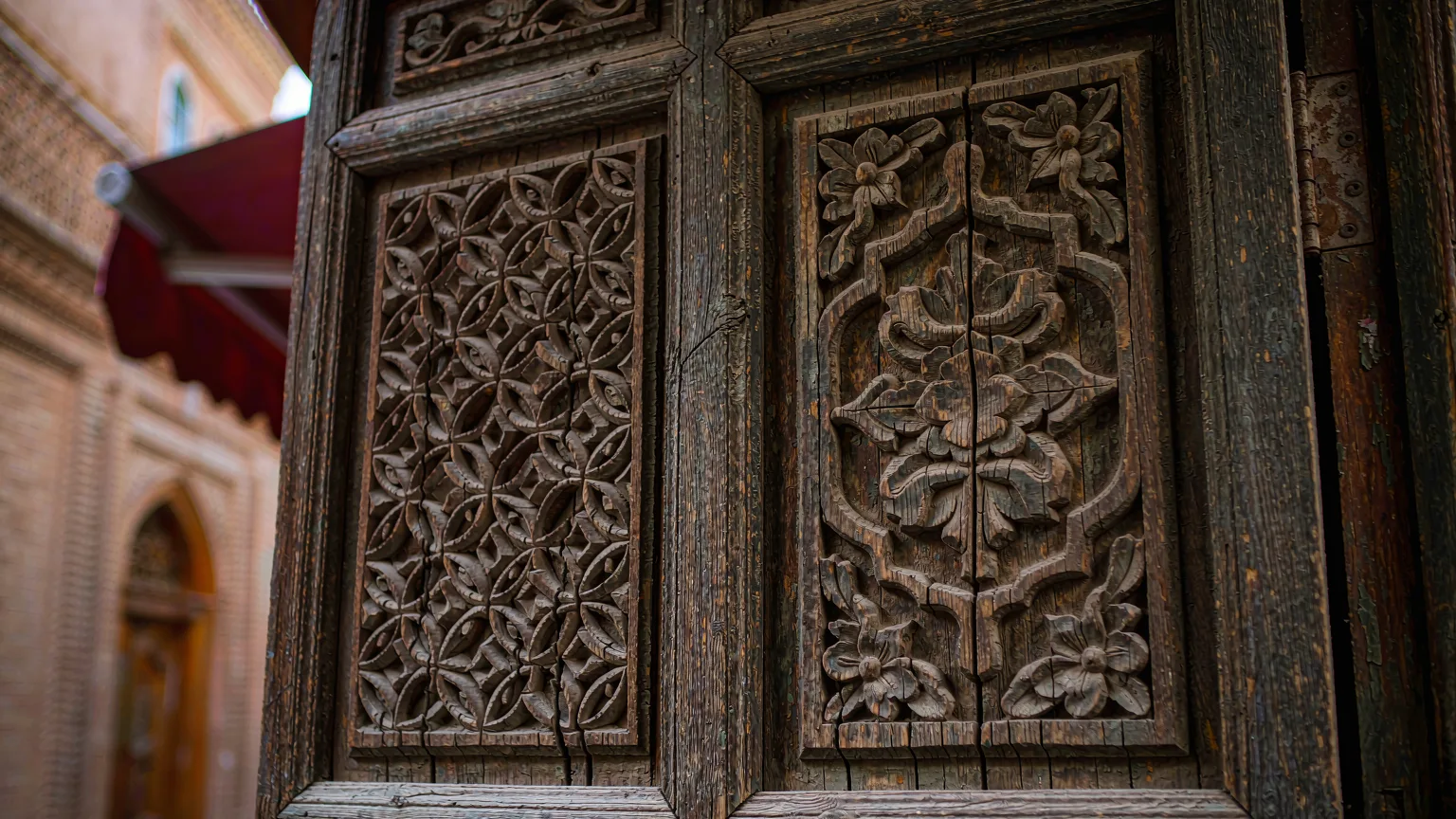 Intricately carved wooden door in Dabancheng Ancient Town