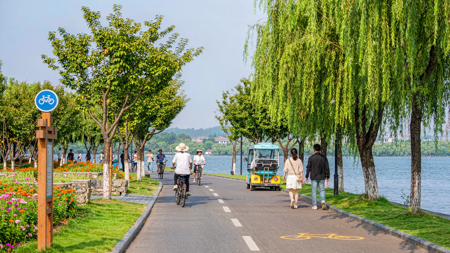 People strolling and cycling on East Lake Greenway in Wuhan