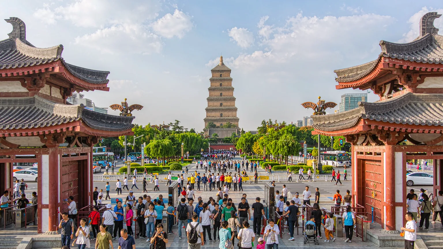 Tourists entering Giant Wild Goose Pagoda square with pagoda ahead