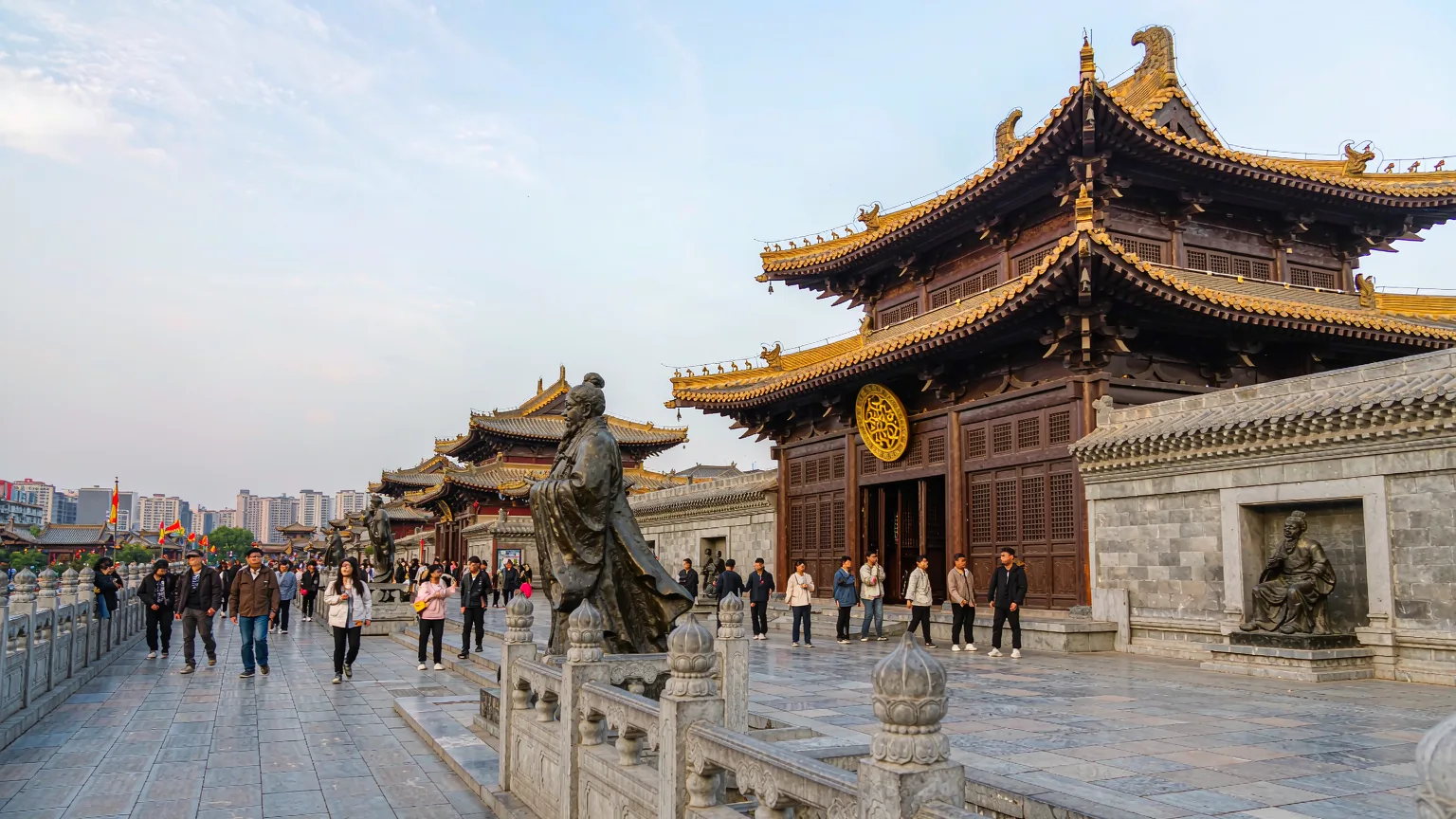 Tang-style palaces and statues along Grand Tang Mall promenade
