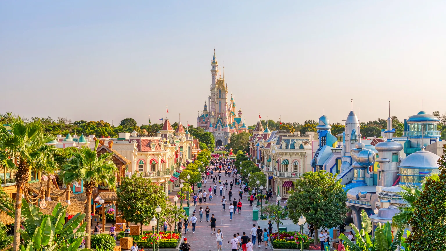 Panoramic view of Hong Kong Disneyland's themed lands on a sunny day