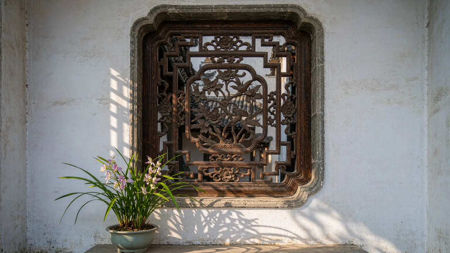 Intricate wooden lattice window with carvings in a Hongcun courtyard