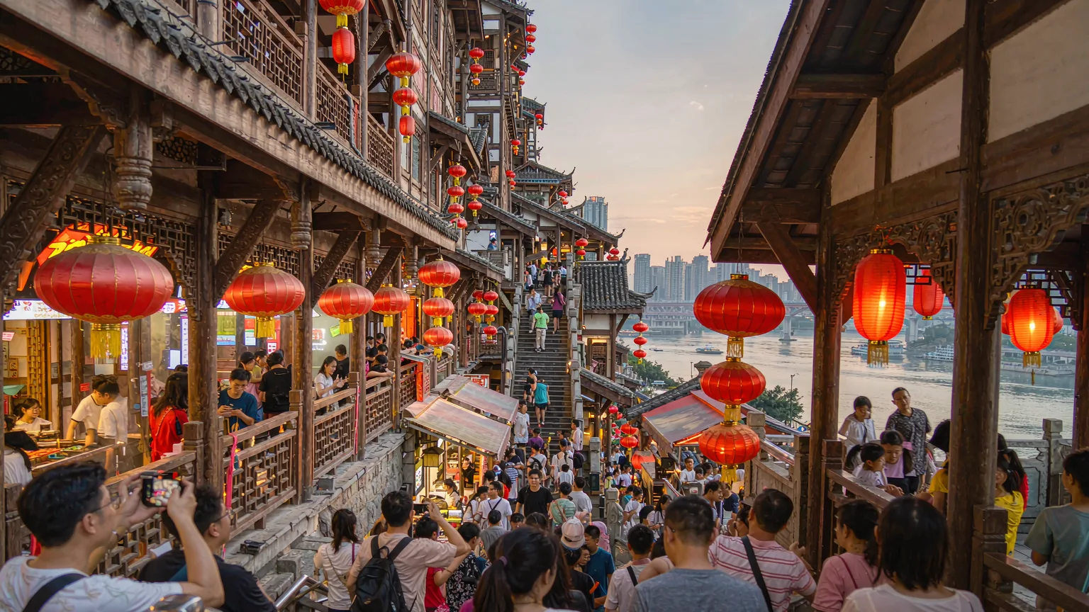 Visitors climbing lantern-lit stairways inside Hongya Cave's busy snack streets