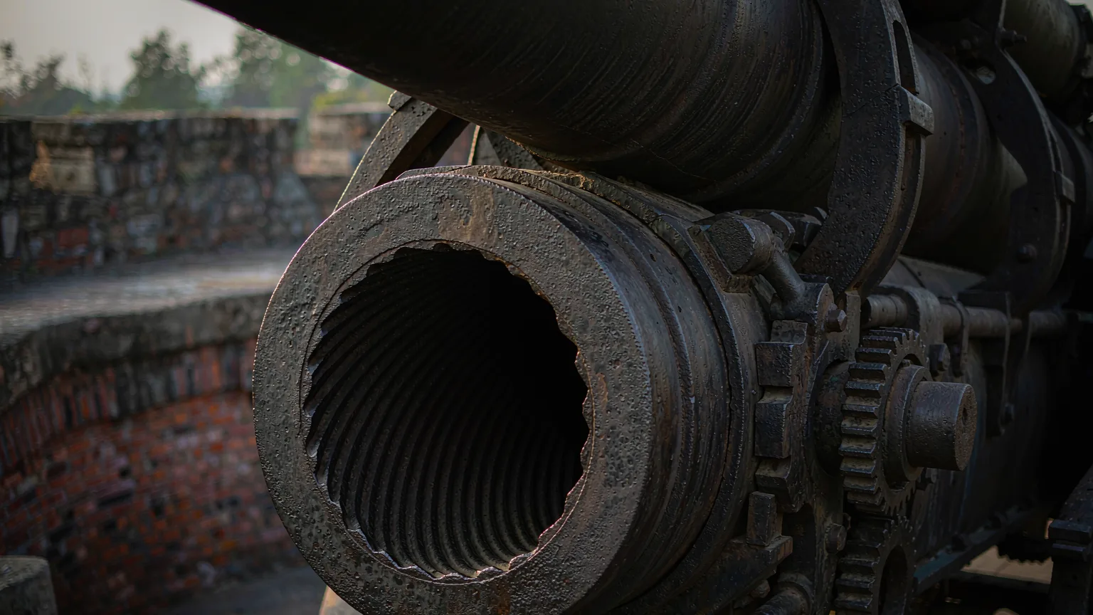 Detailed close-up of Krupp cannon's ironwork and rifling at Hulishan Fortress