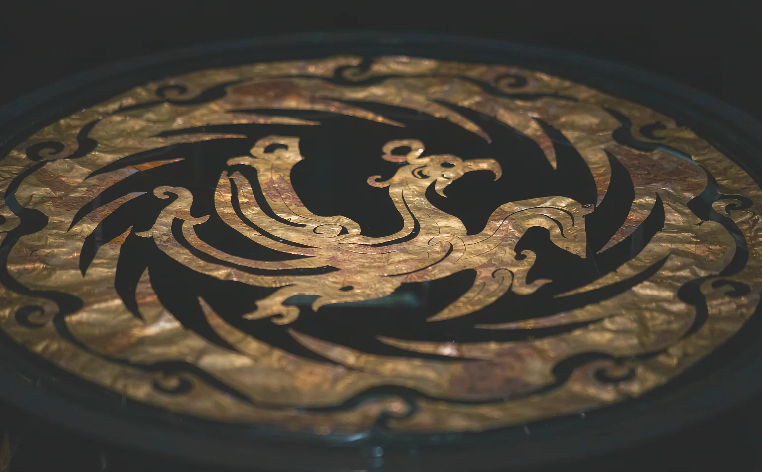 The Golden Sun Bird gold foil artifact of Jinsha Site Museum
