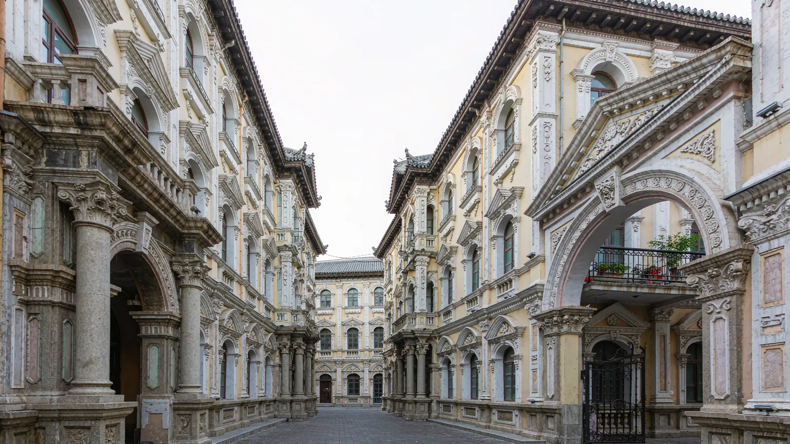 Chinese Baroque facades with European columns on traditional courtyard houses in Lao Daowai