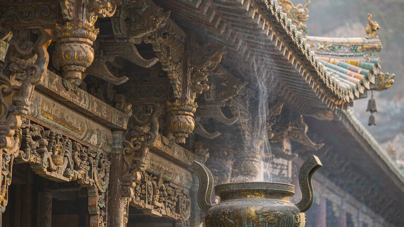 Intricate Taoist carvings and golden temple details on Laojun Mountain