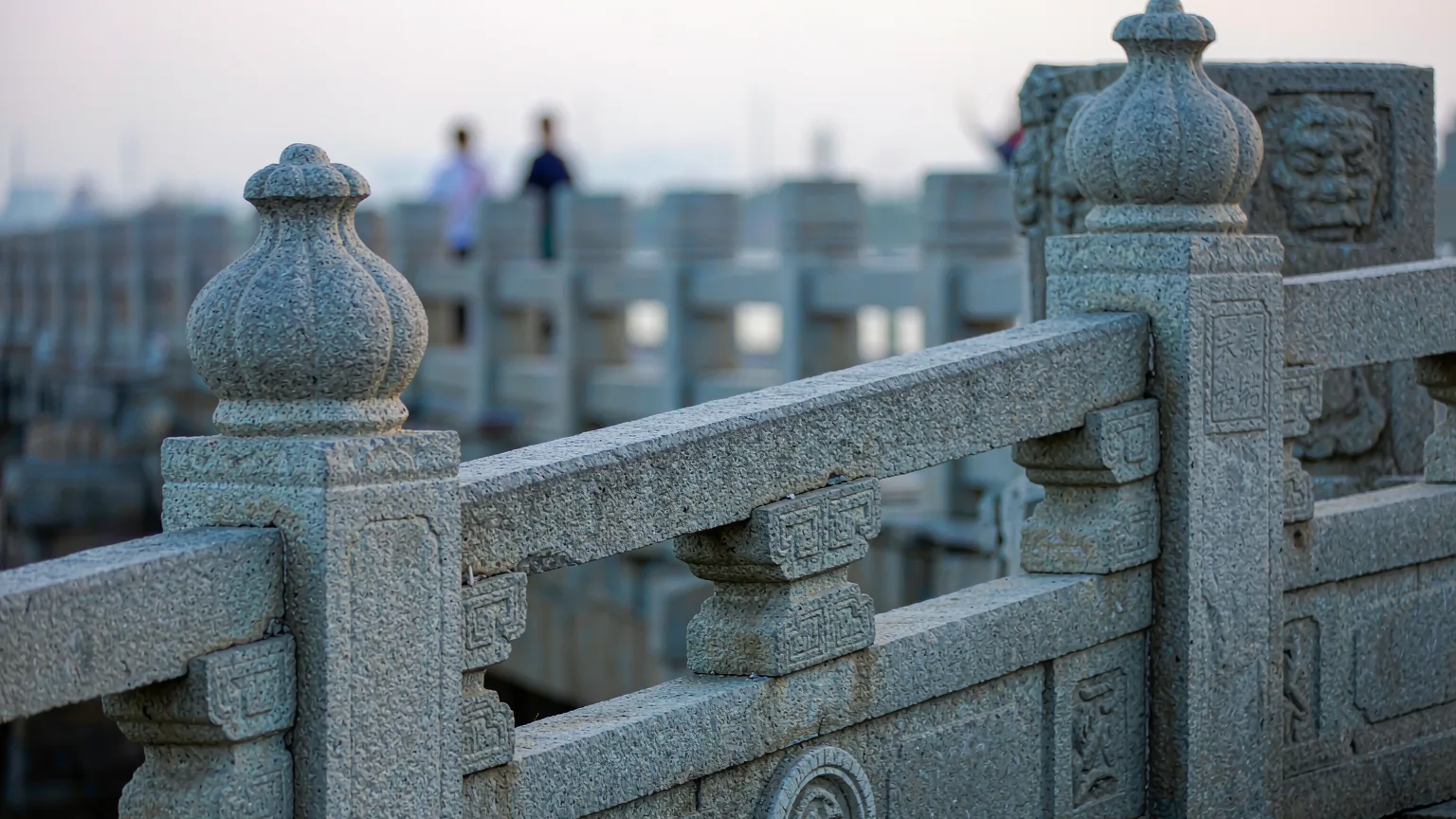 Intricate stone carving on Luoyang Bridge's railing