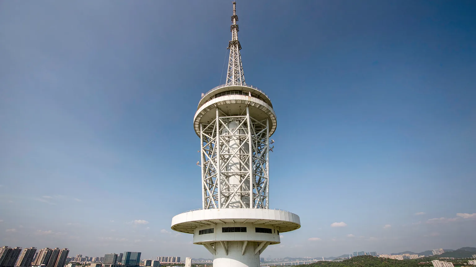 Macau Tower lattice structure with panoramic views of Macau skyline
