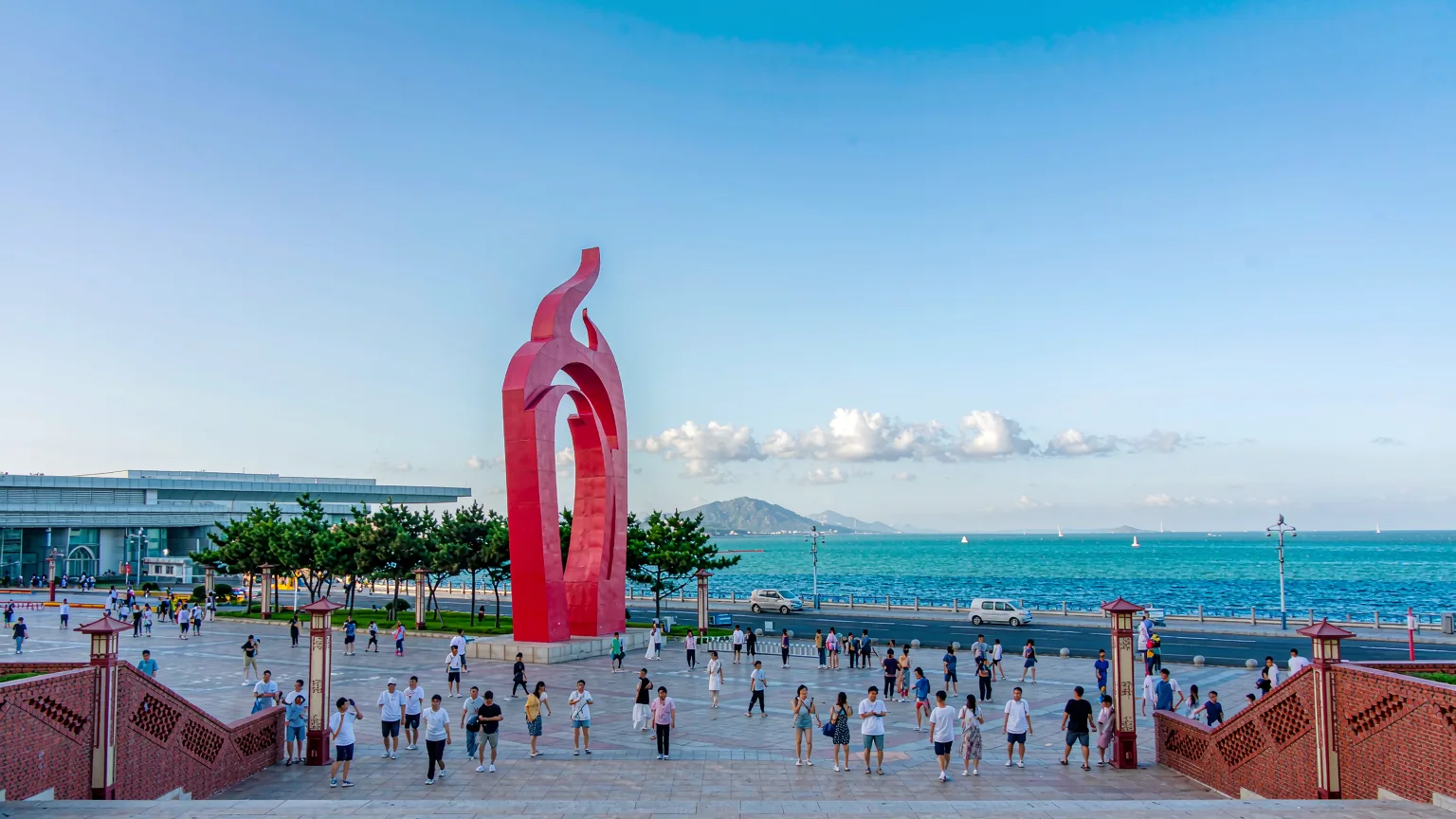 Panoramic view of May Fourth Square plaza and May Wind sculpture