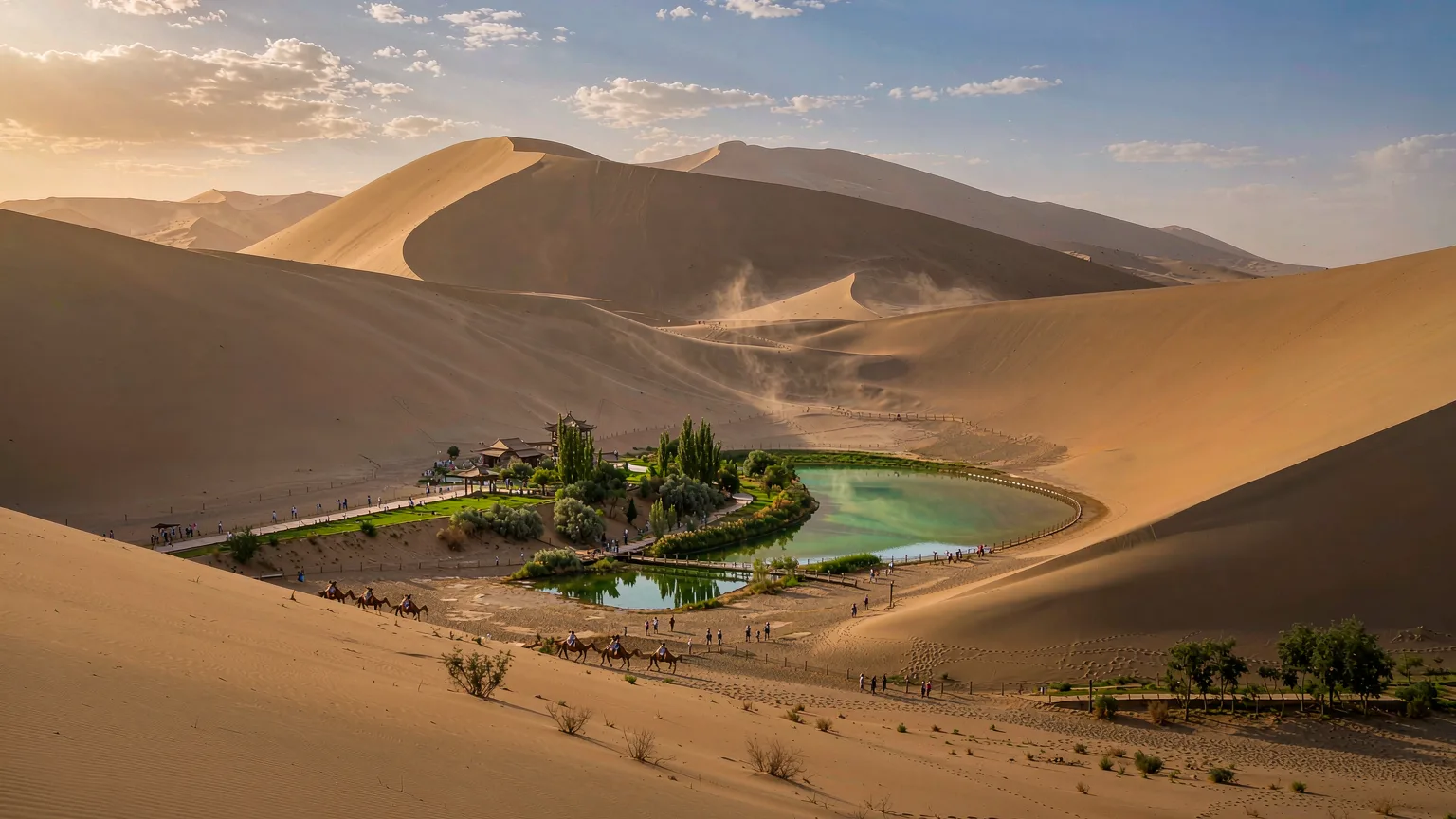 Crescent Lake oasis amid towering sand dunes in Dunhuang desert