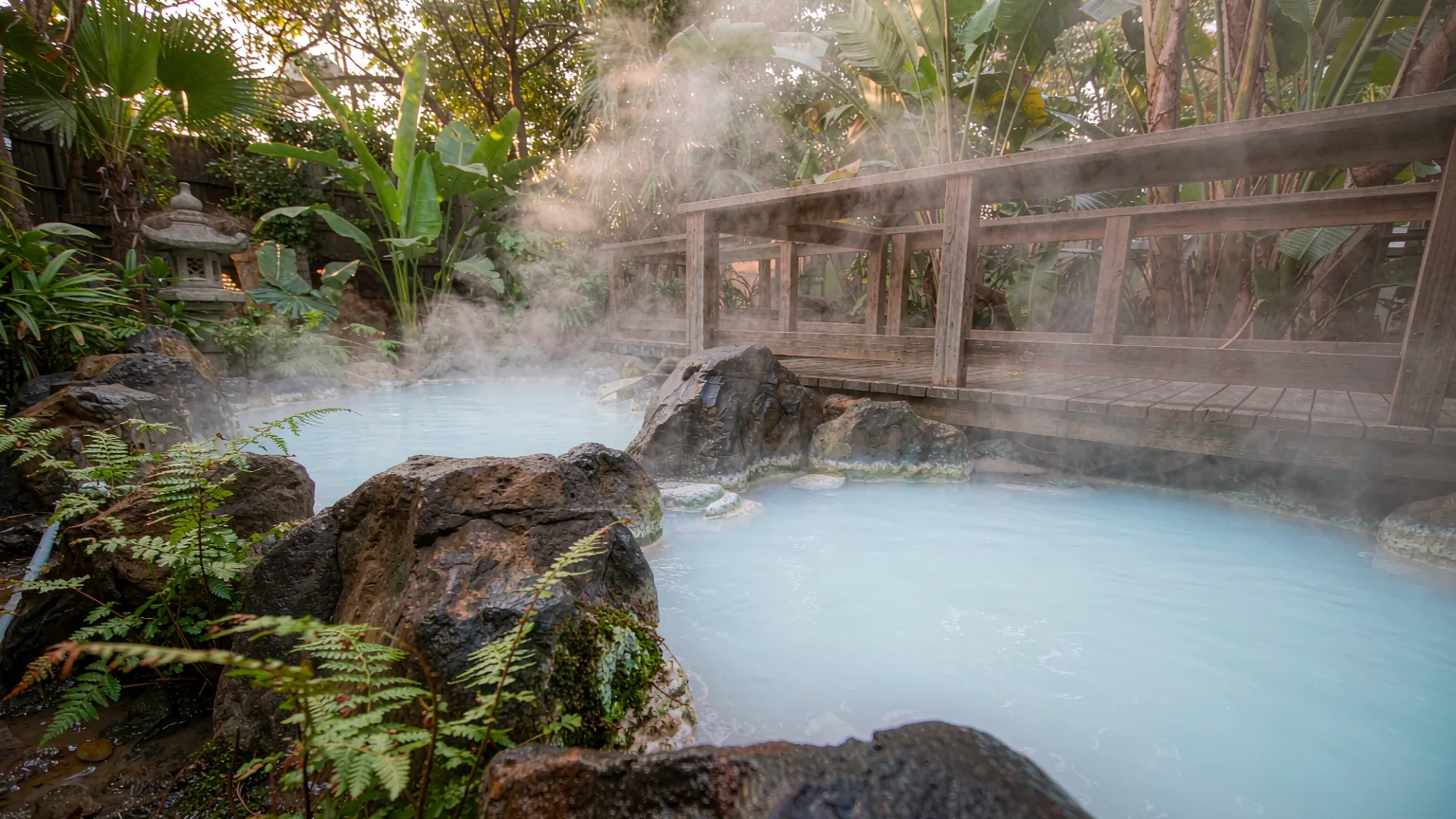 Steaming volcanic mineral springs pool at Mission Hills Haikou