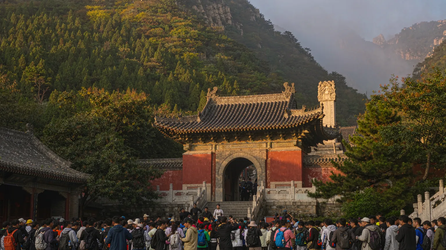 Visitors at Mount Tai entrance gate with guide, starting the climb