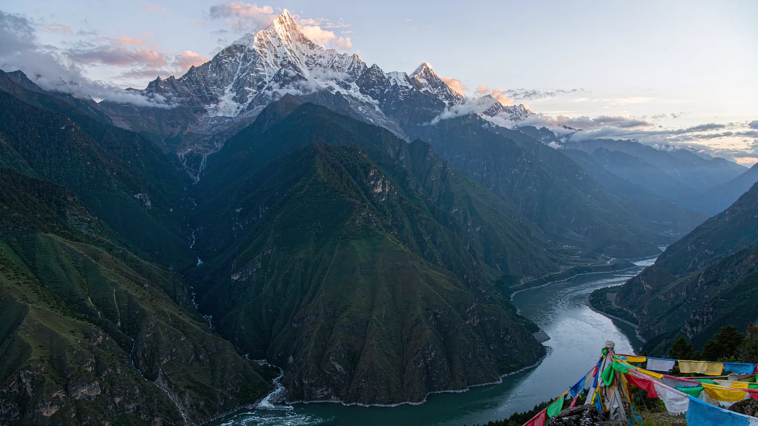 Namcha Barwa towering over Yarlung Tsangpo Grand Canyon with prayer flags