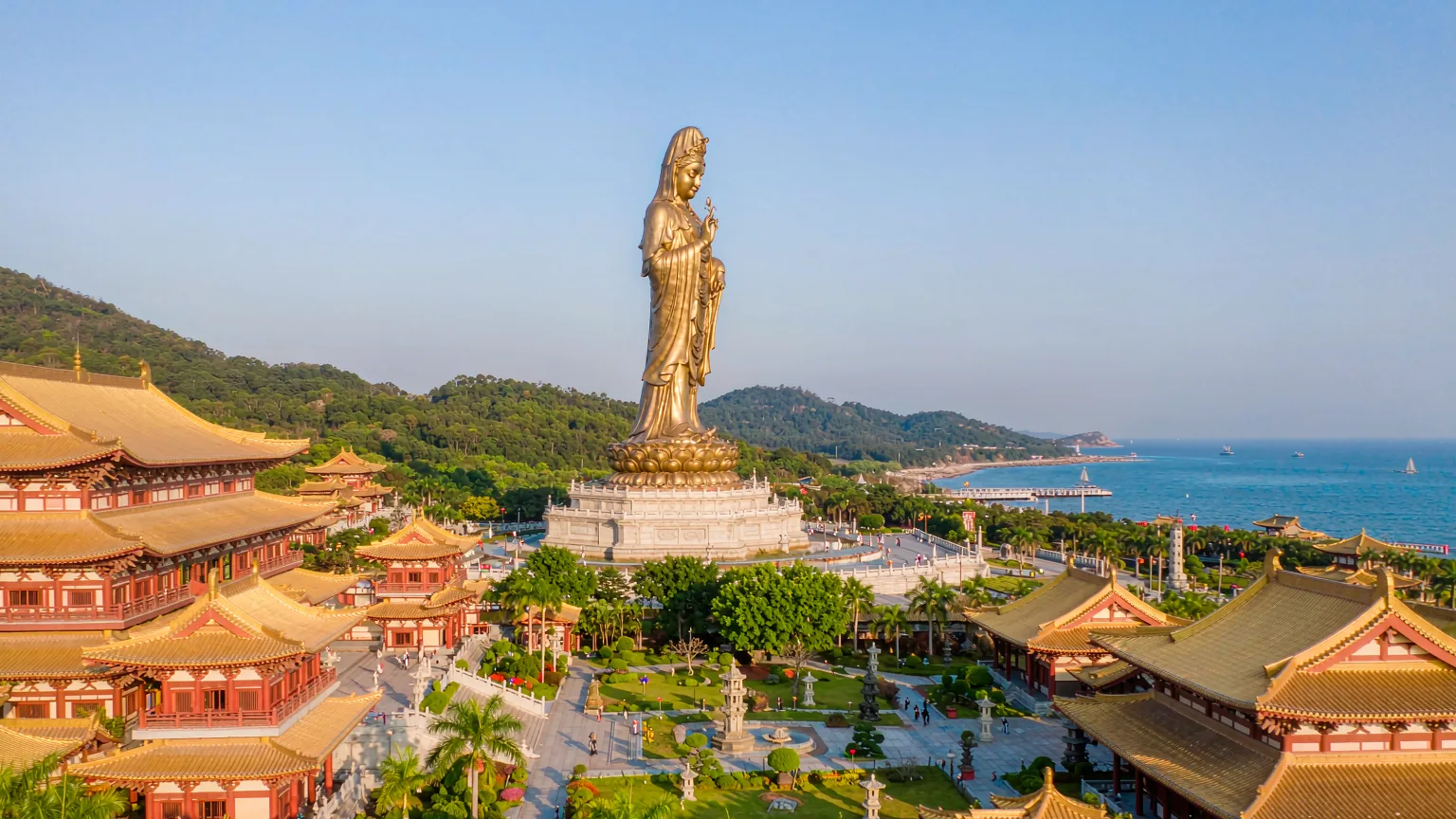 Panoramic view of Nanshan Buddhist park with Guanyin statue and temples