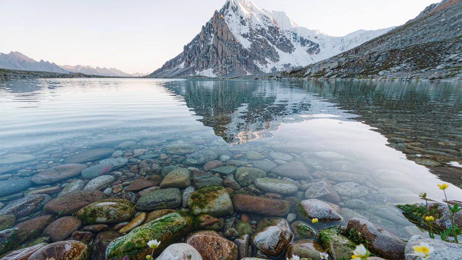 Close-up of clear water and pebbles at Pearl Lake shore