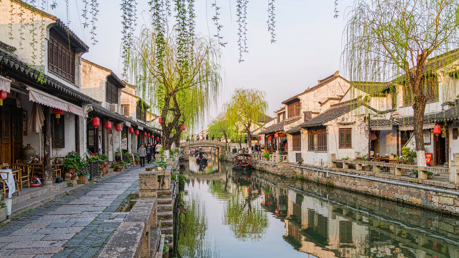 Whitewashed houses and weeping willows along Pingjiang Canal in Suzhou