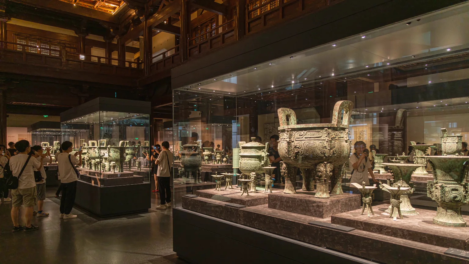 Ancient Chinese bronze vessels displayed in Shanghai Museum's elegant gallery
