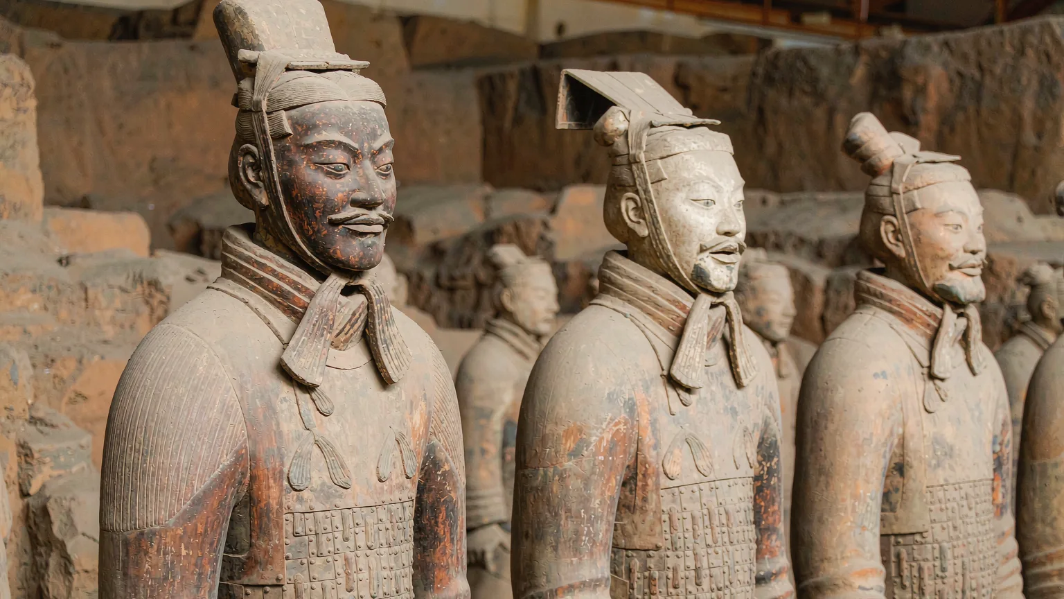 Terracotta warriors with unique faces in excavated pit