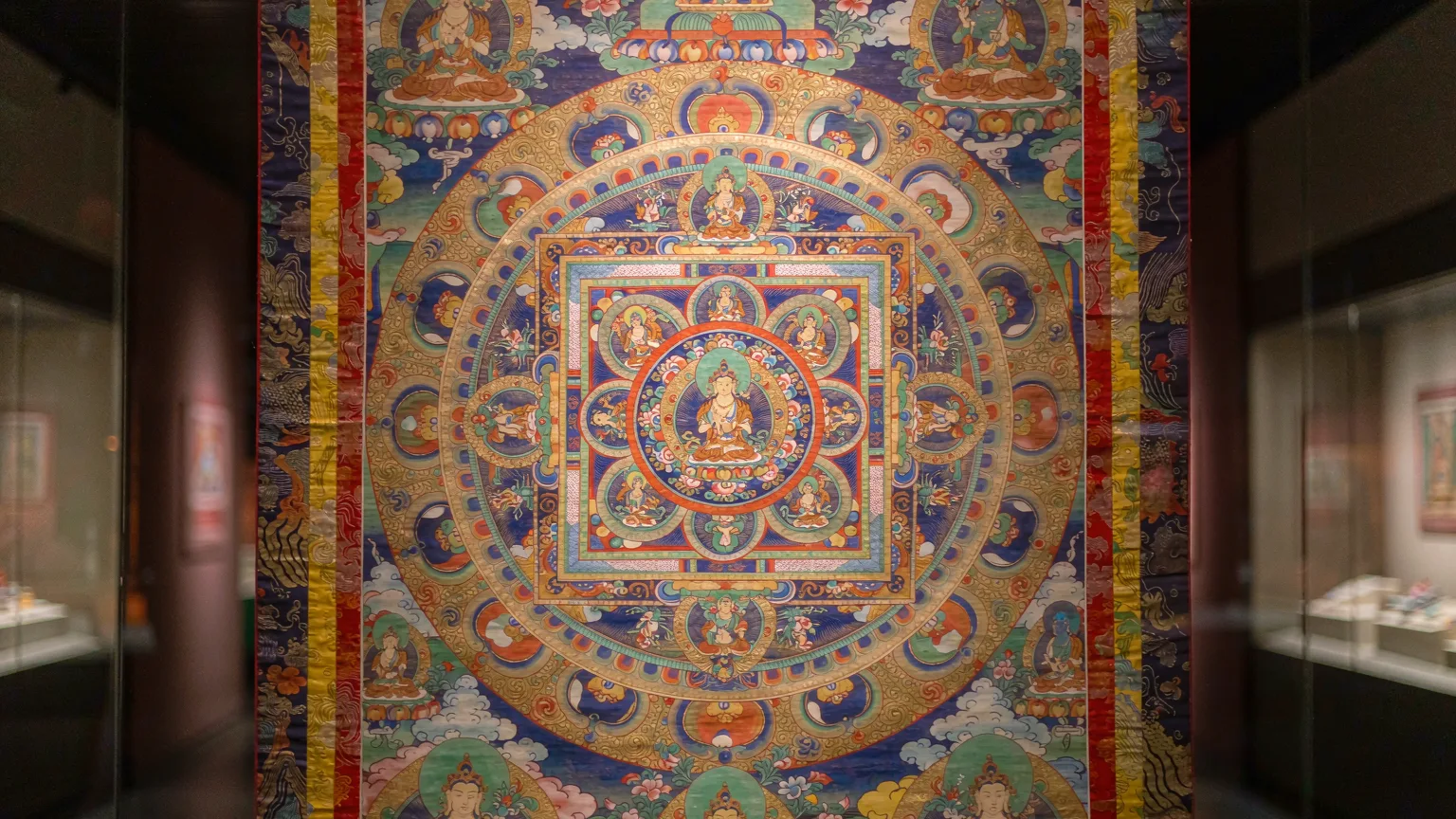 Detailed close-up of a colorful thangka painting in Tibet Museum