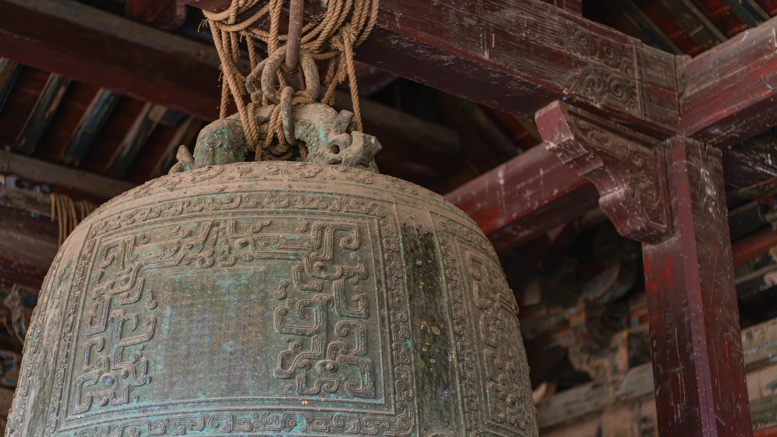 Detailed view of ancient bronze bell inside Xi'an Bell Tower