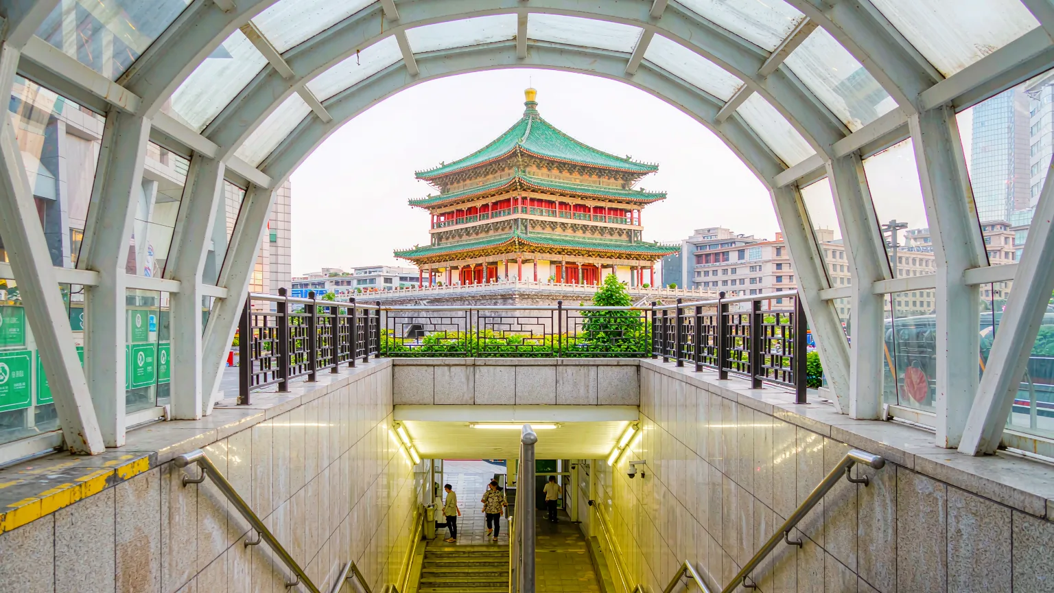 Visitors entering Xi'an Bell Tower via underground passage entrance