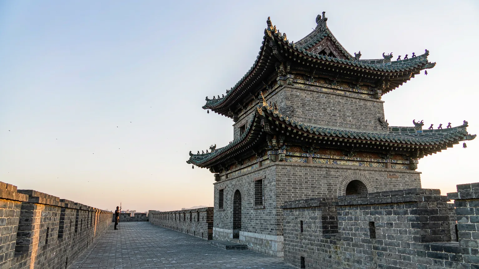 Corner watchtower on Xi'an City Wall with detailed brickwork and roof tiles