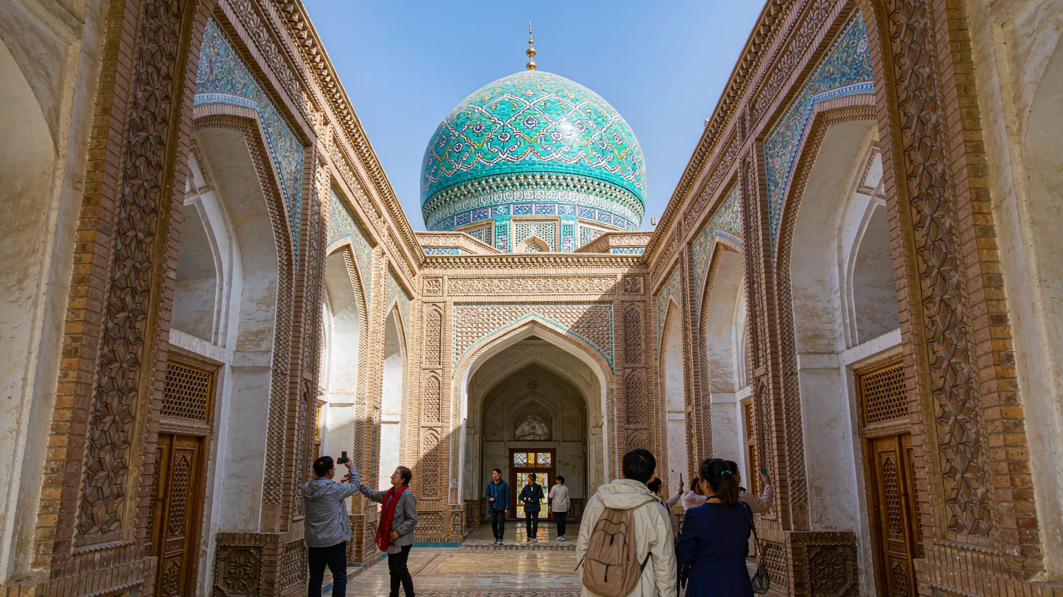 Grand mausoleum hall of Xiangfei Garden with turquoise dome and ornate brickwork