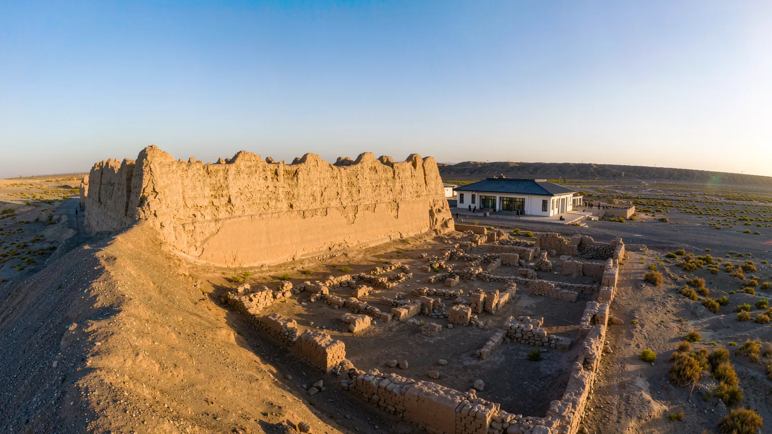Panoramic view of Yangguan Pass ruins and museum in desert