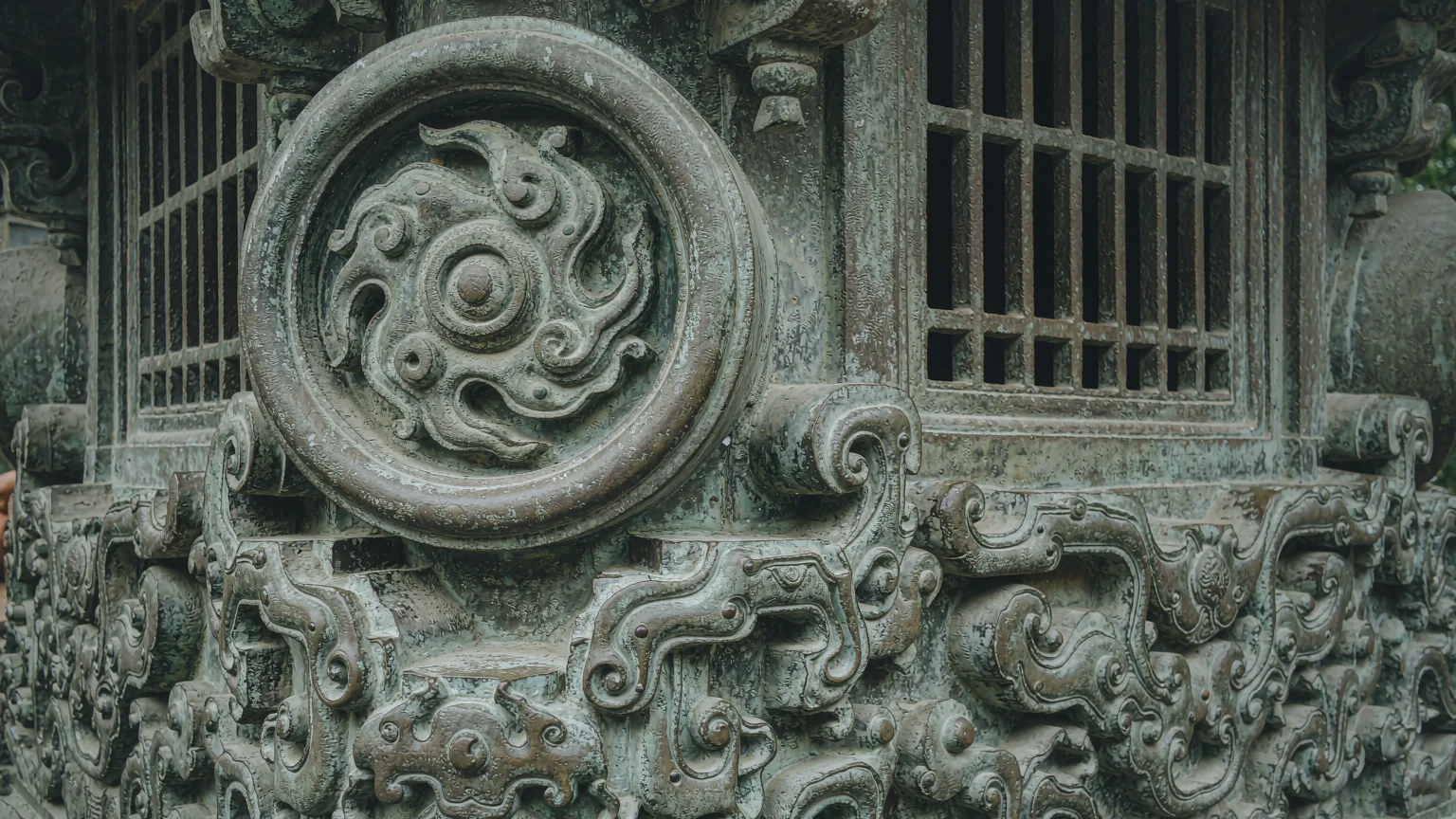 Detailed carvings on the base of the Yanhuang Emperors statues