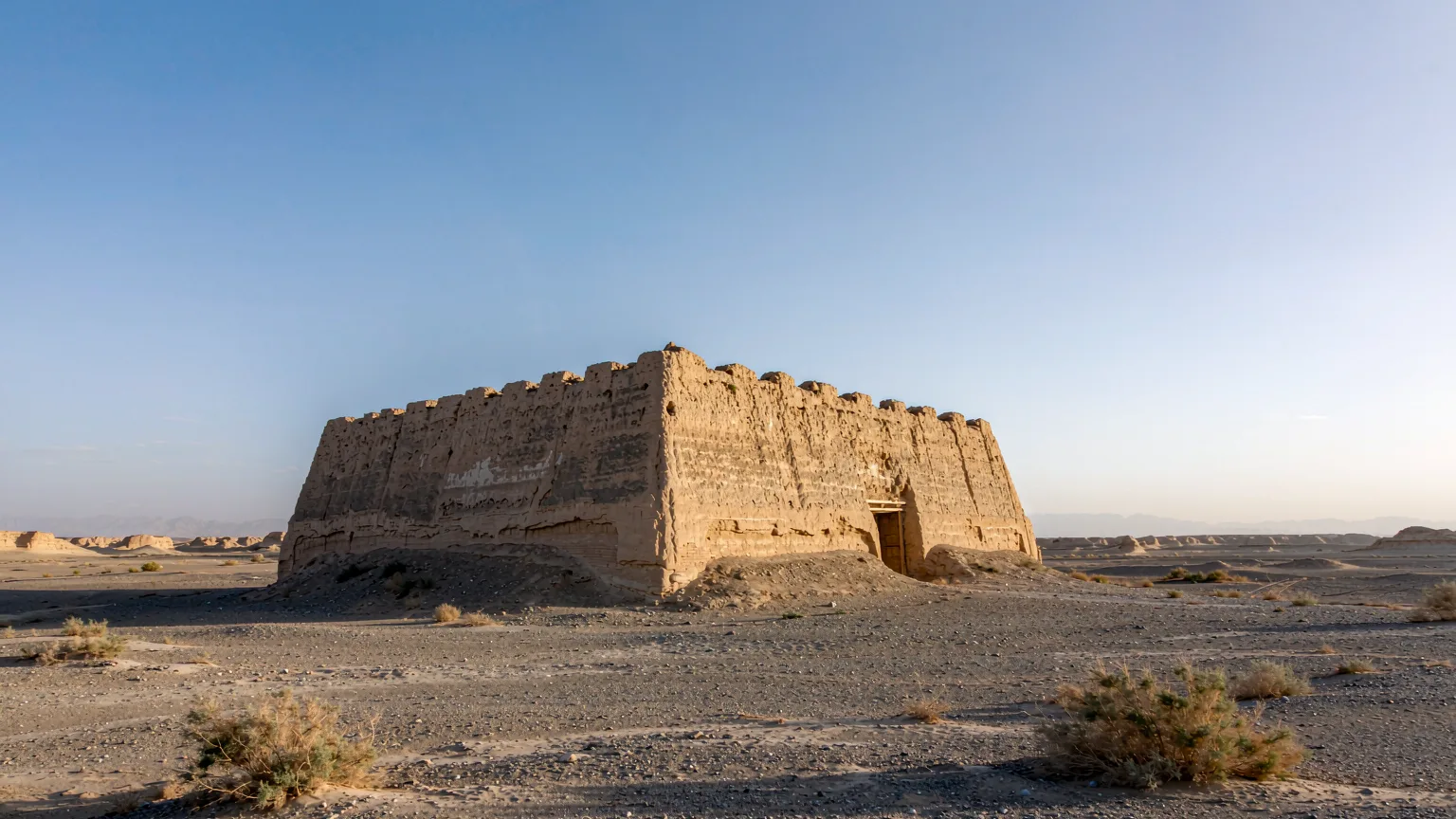 Xiaofangpan fortress at Yumen Pass with weathered earthen walls