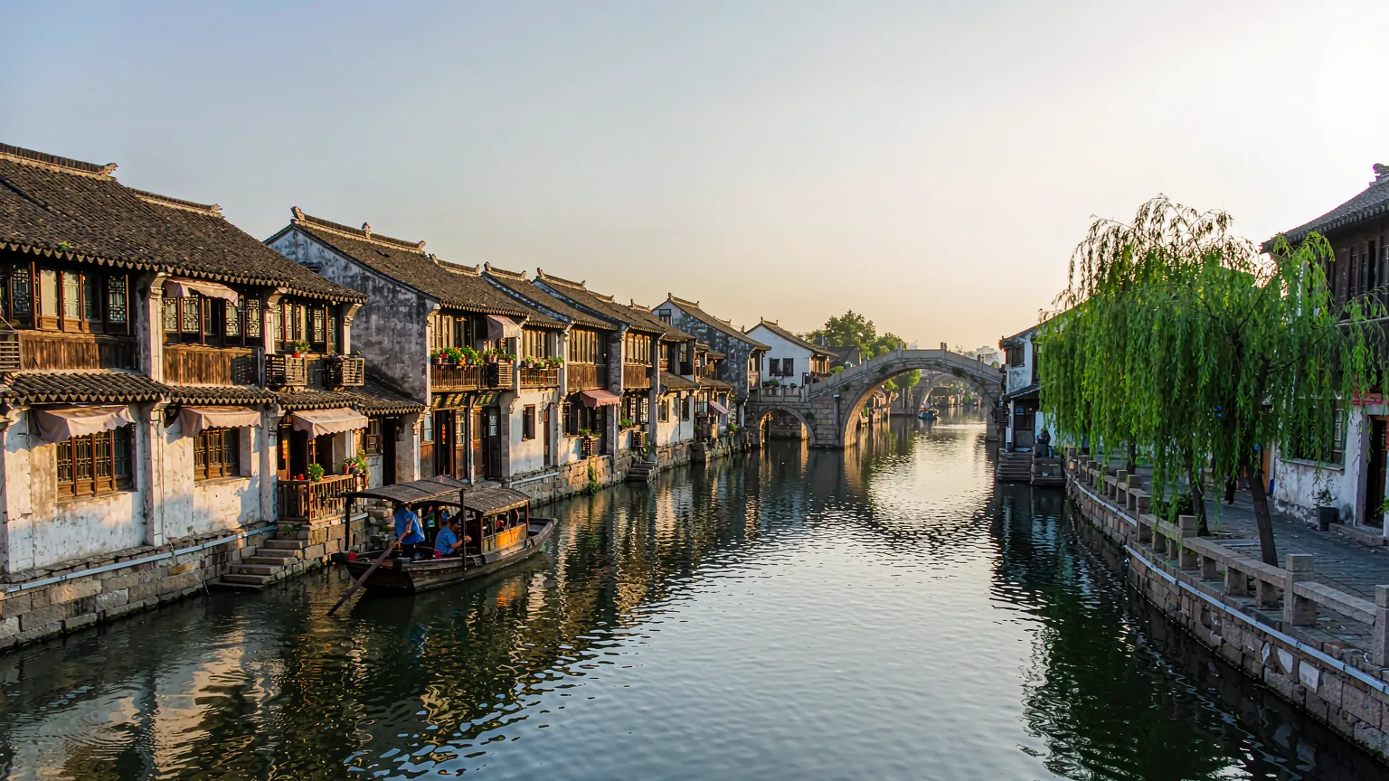 Traditional Jiangnan houses and stone bridges along Zhouzhuang's canal